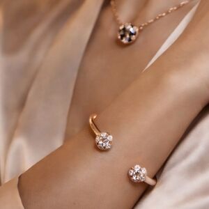 KATE SPADE NEW YORK Crystal Lady Marmalade Hinged Cuff – Rose Gold-Tone Bracelet